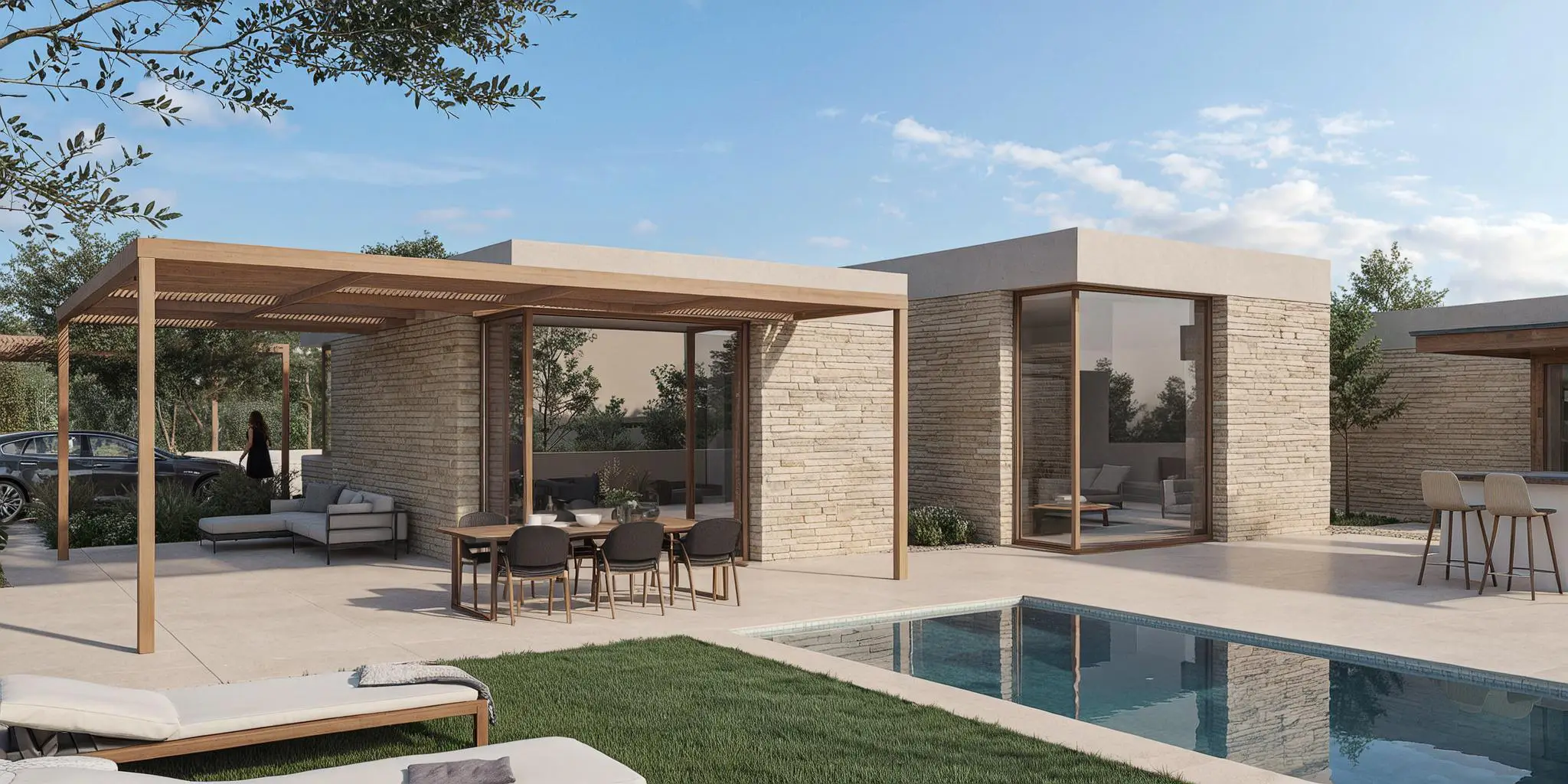 Relación directa entre espacios interiores y patio ajardinado con piscina | E6A